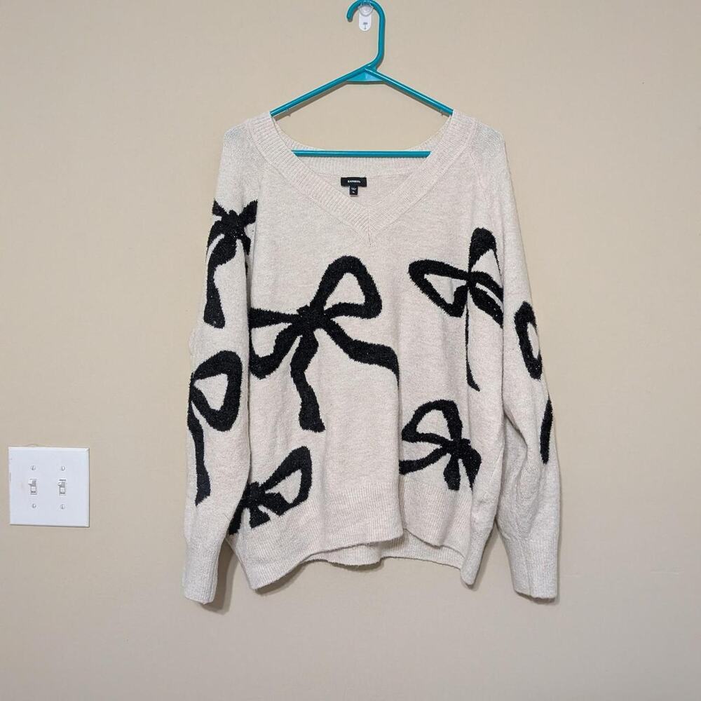 Express Cozy Coquette Cream Sweater With Black Bow Design